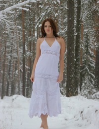 Lena S: Urals by Oleg Morenko - Seductive and unhibited, Lena frolics on the white, cold snow.